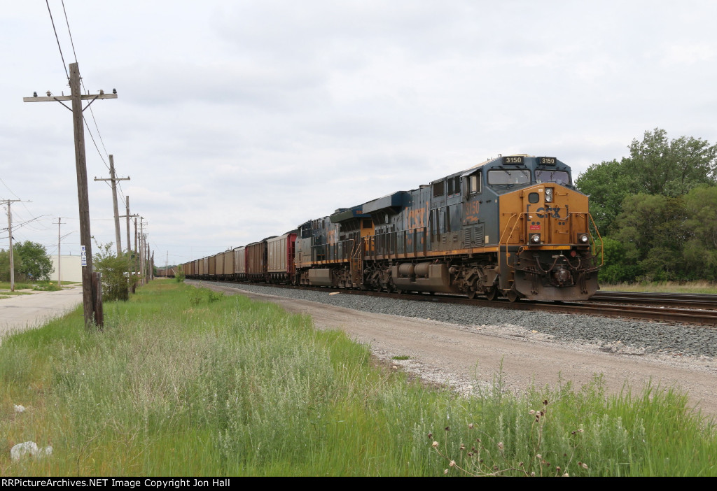 CSX 3150 & 3305 wait to go east with a loaded coke train